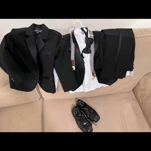 Kids Tux complete three piece with tie suspenders and shoes. Tux 4T shoes 13M.